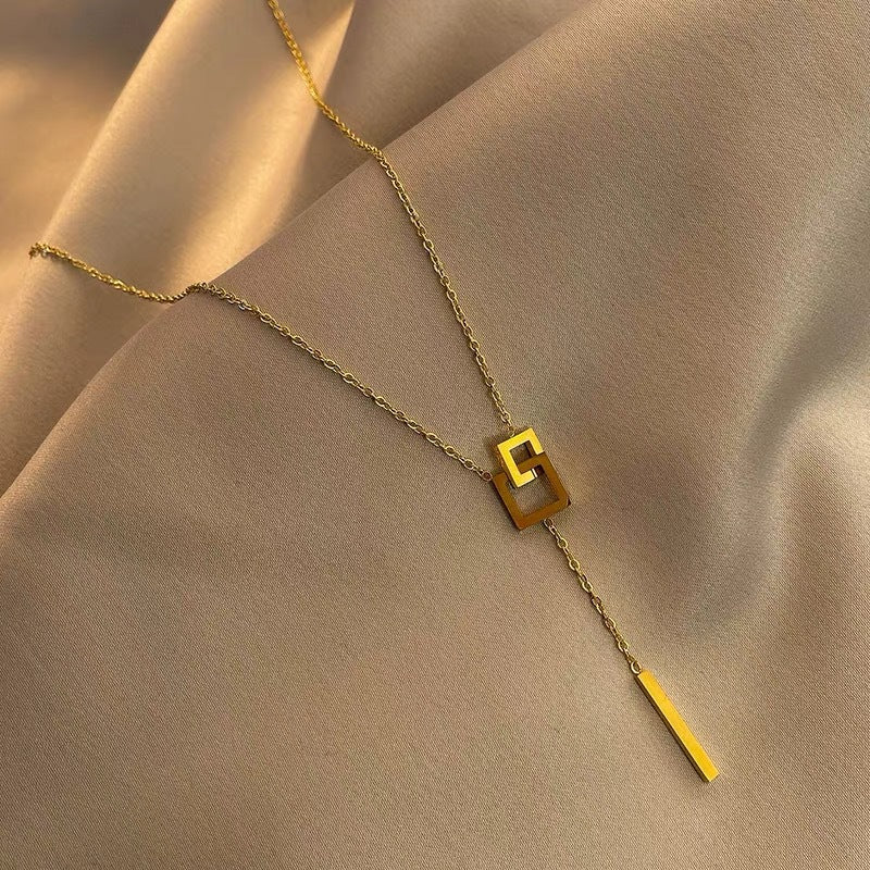 Cube shaped dropdown necklace